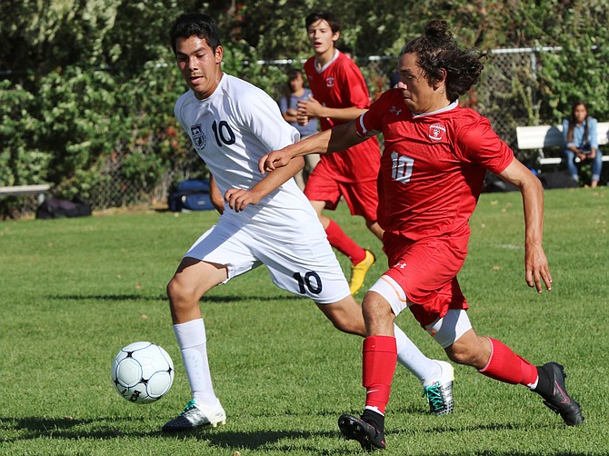 Cruz Archuleta takes on a Rifle player Thursday in 5-1 win.