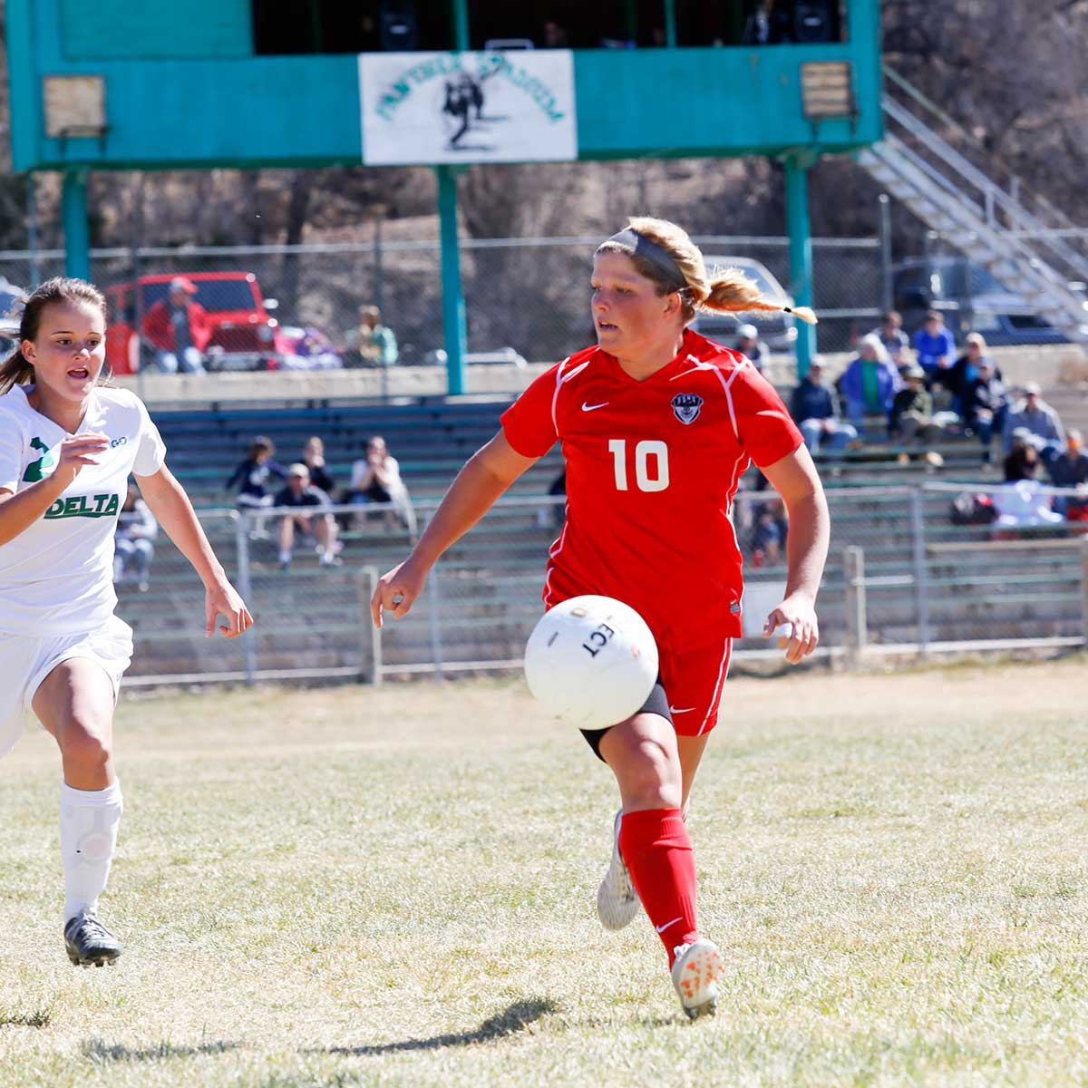 Ellese Lupori moves the ball down the field against Delta. Photo by Casey Barnett